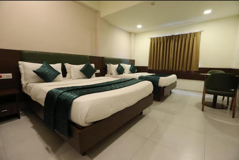 Greenotel Rooms Hazira, Surat Exterior photo